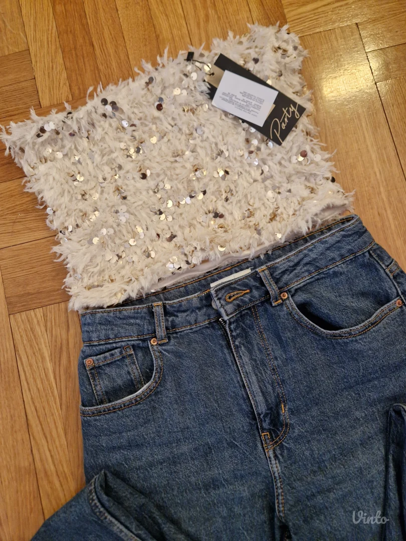 Top od perja i sljokica