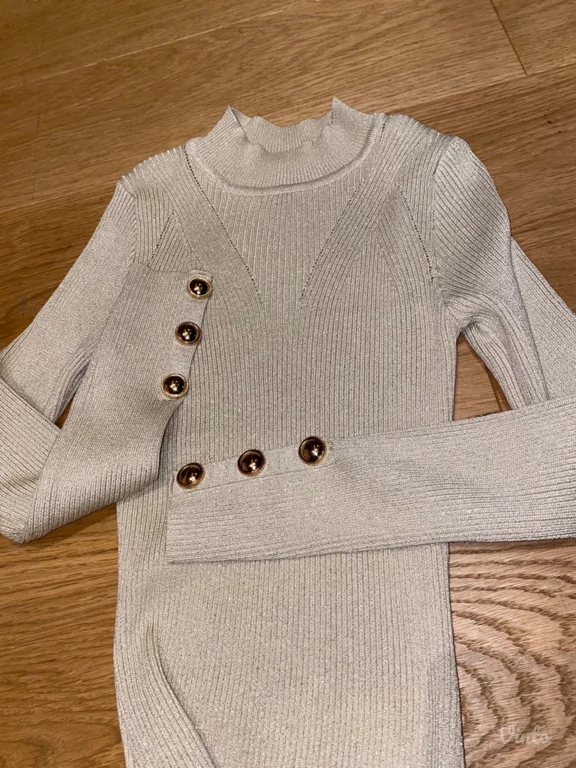 Koncana zlatna haljina