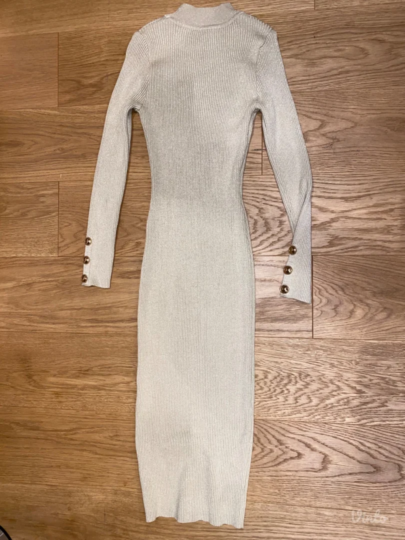 Koncana zlatna haljina