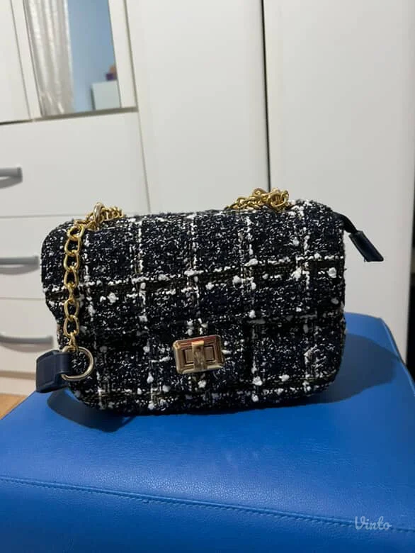 Elegantna zenska teget torbica