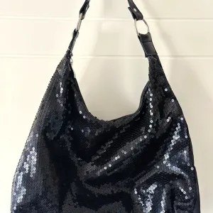 Crna torba sa šljokicama