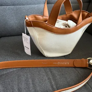 Sinsay torbica i kais