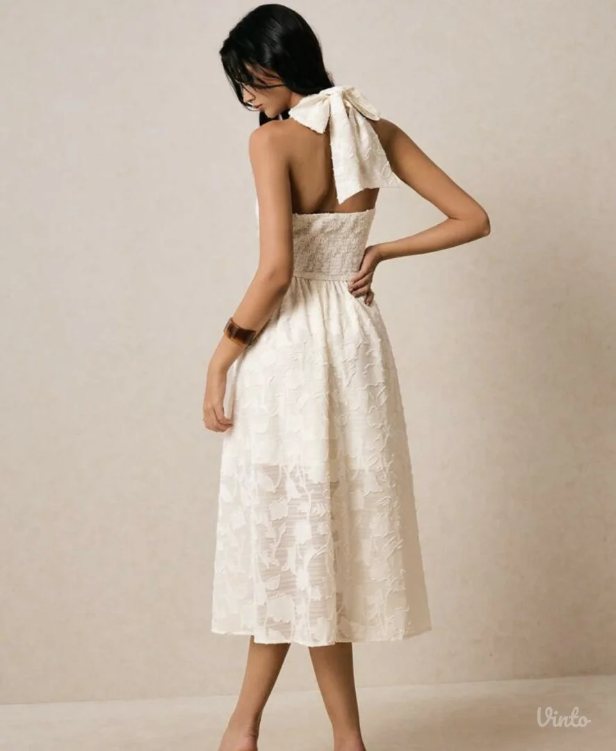 Bela ženska haljina