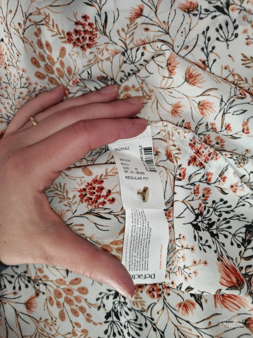 De facto lepršava bluza