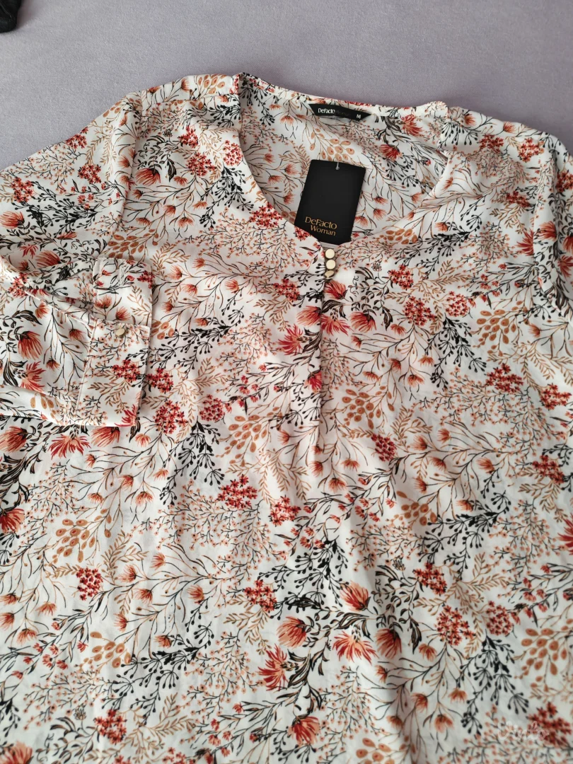 De facto lepršava bluza