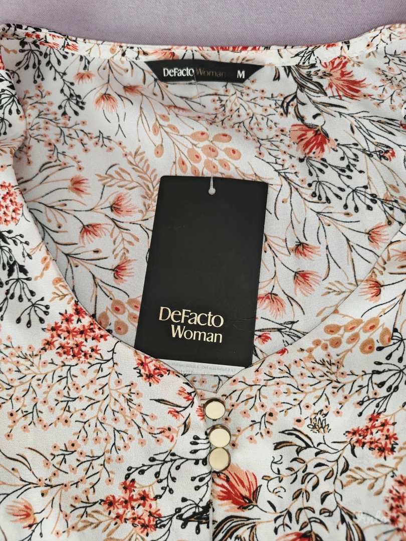 De facto lepršava bluza