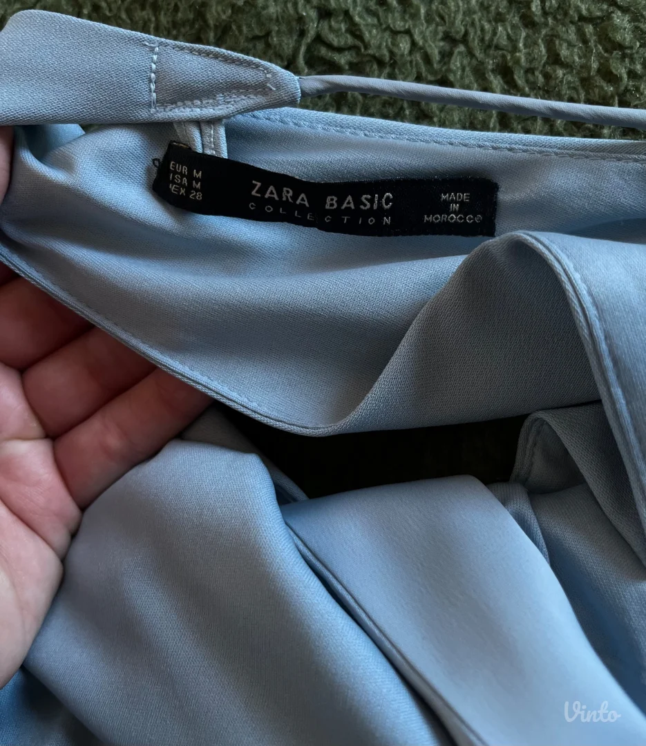 Zara svetlo plavi kombinezon sa sivim podtonom – M