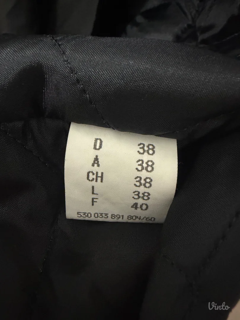 Crni zenski kaput sa zebra detaljima