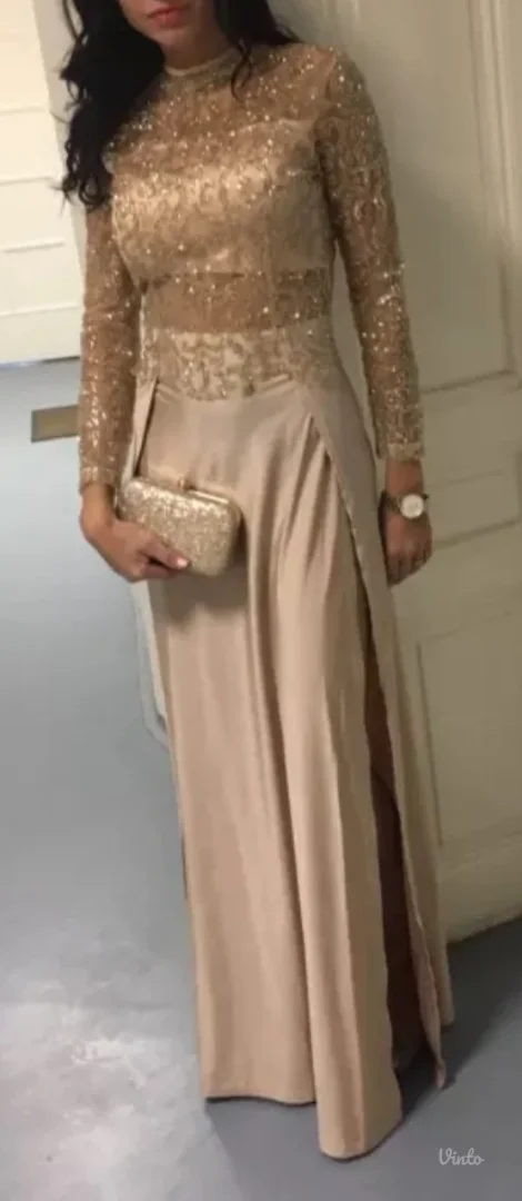 Duga svecana zlatna haljina