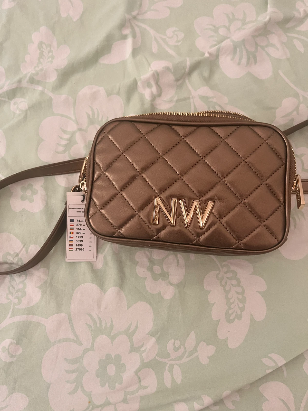 Nine West Greenwich torbica sa etiketom (dark silver)
