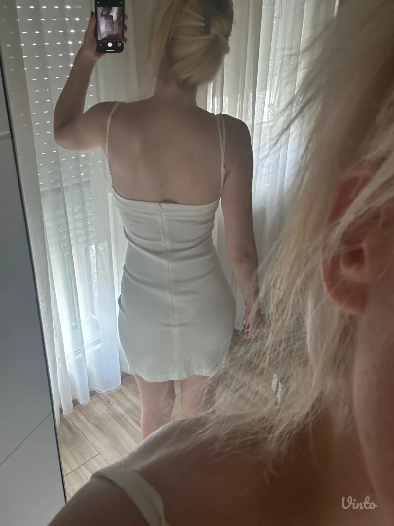 Bela svecana haljina