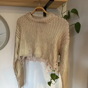 Zara džemper zlatni