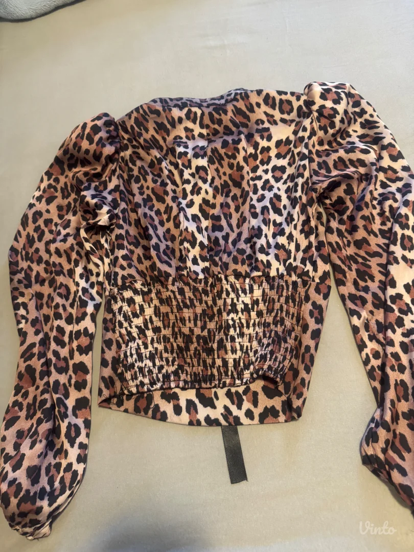 Tigrasta bluzica nova