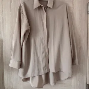 Bež košulja