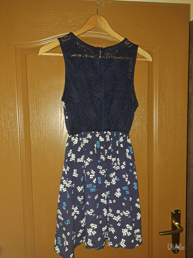 Teget haljina sa detaljima