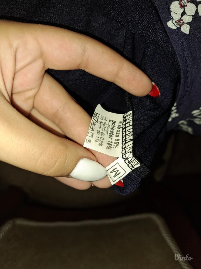 Teget haljina sa detaljima