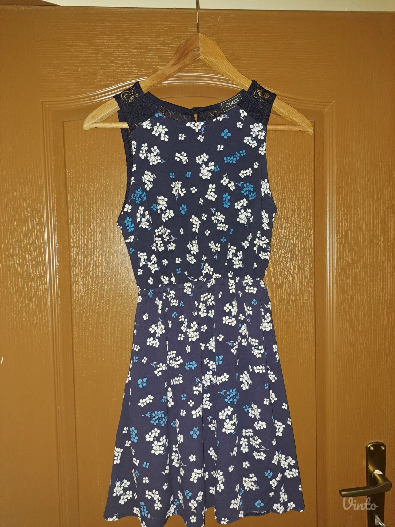 Teget haljina sa detaljima