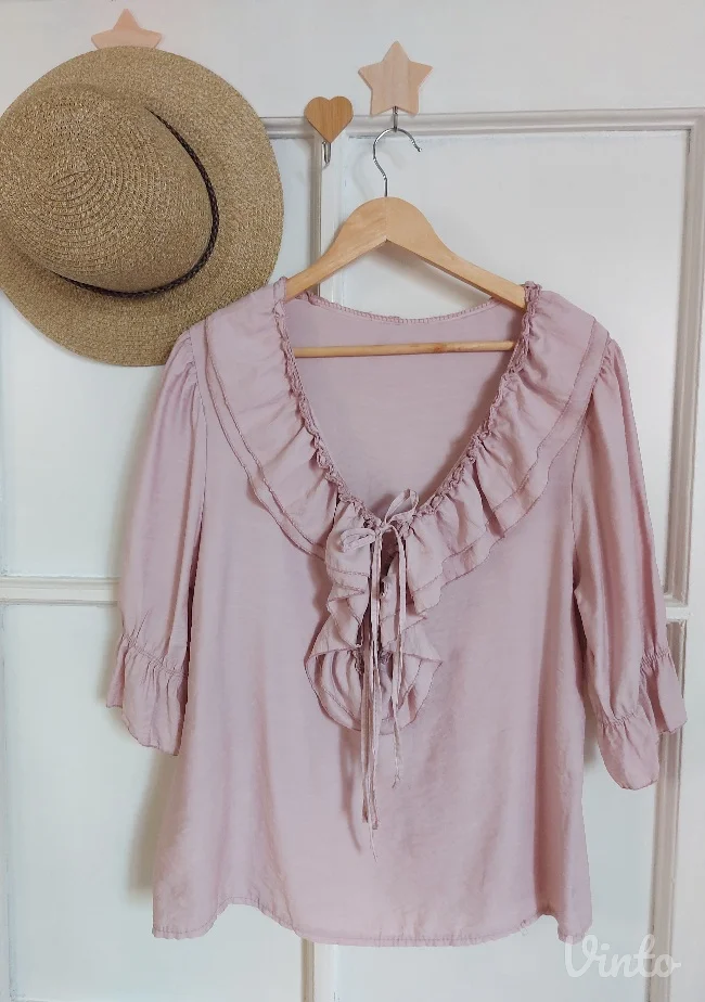 Pastel roze bluza sa karnerima