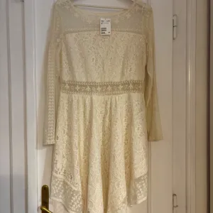 H&M Haljina sa postavom