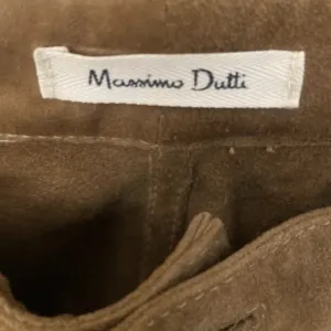 Massimo Dutti kozne pantalone