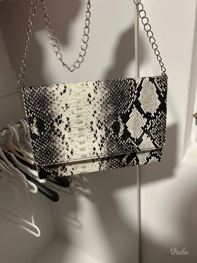 Elegantna ženska torbica sa snake printom