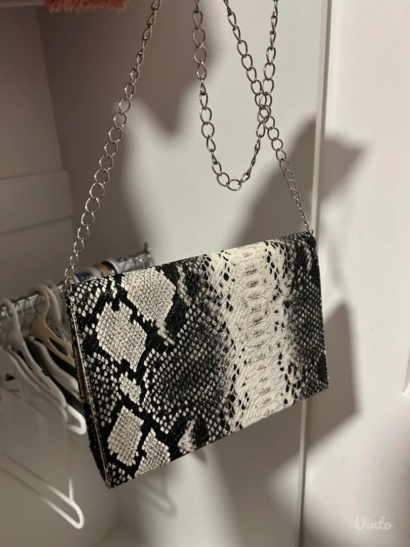 Elegantna ženska torbica sa snake printom