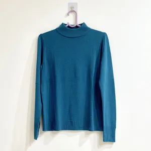 184. Marks & spencer tirkizna polurolka