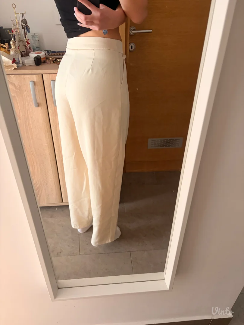 Bež široke pantalone za posao