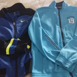 Dva duksa Nike i Champion 13/14 god