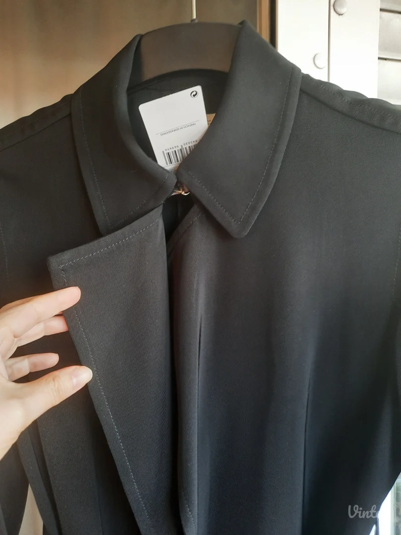 Mango mantil sa etiketom