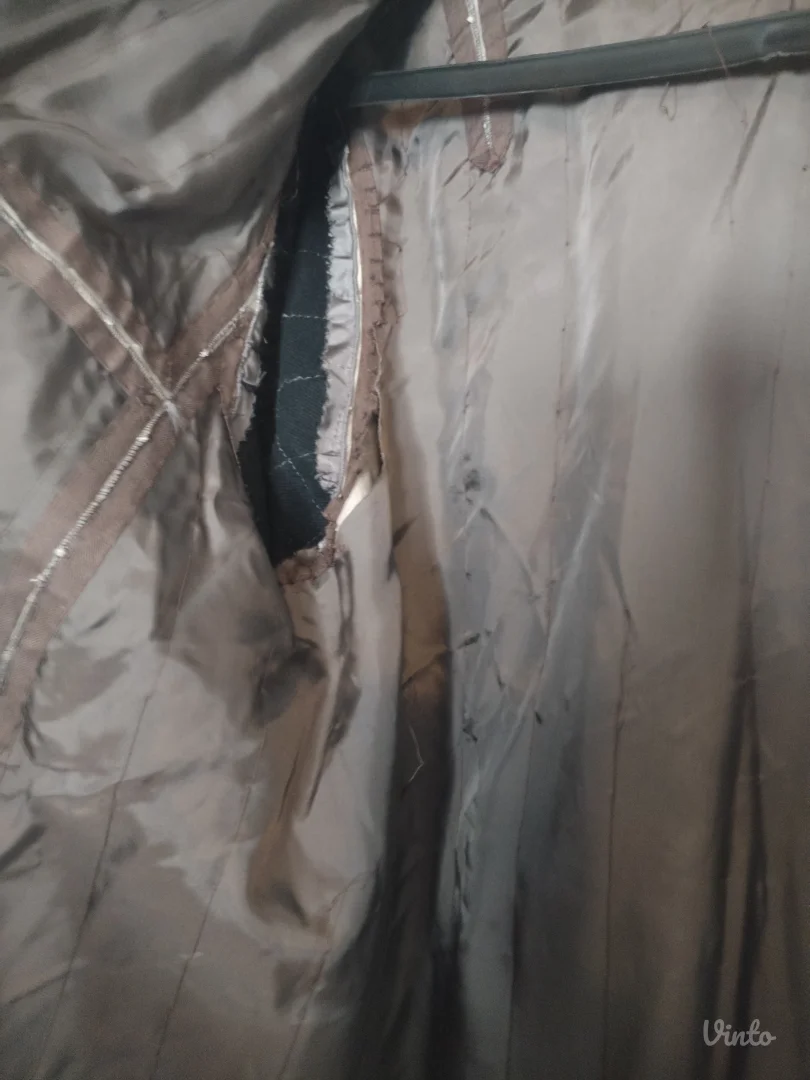 Ženska duga bunda sa krznom tanka za proleće – potrebno srediti postavu