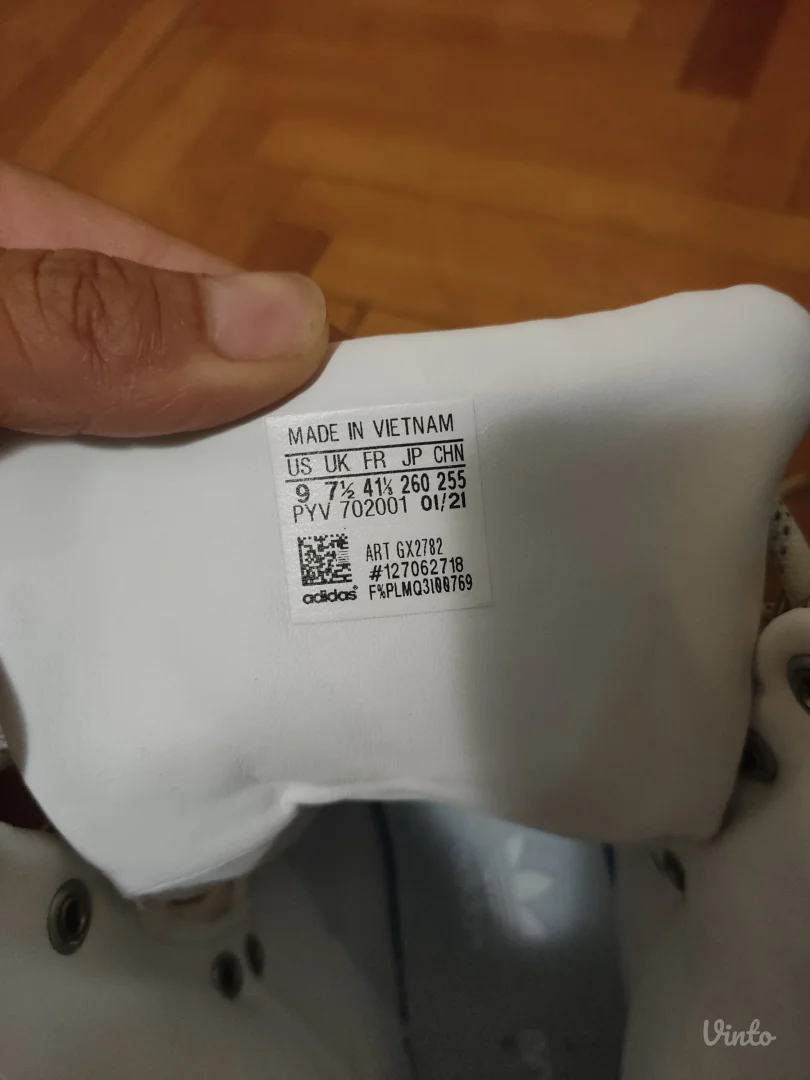 Ivy Park super sleek boots in white.