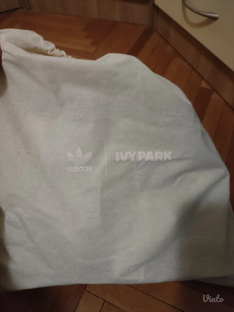 Ivy Park super sleek boots in white.