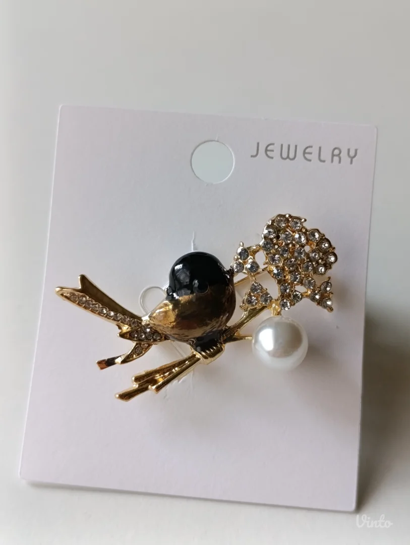 Broš - pticica na grani