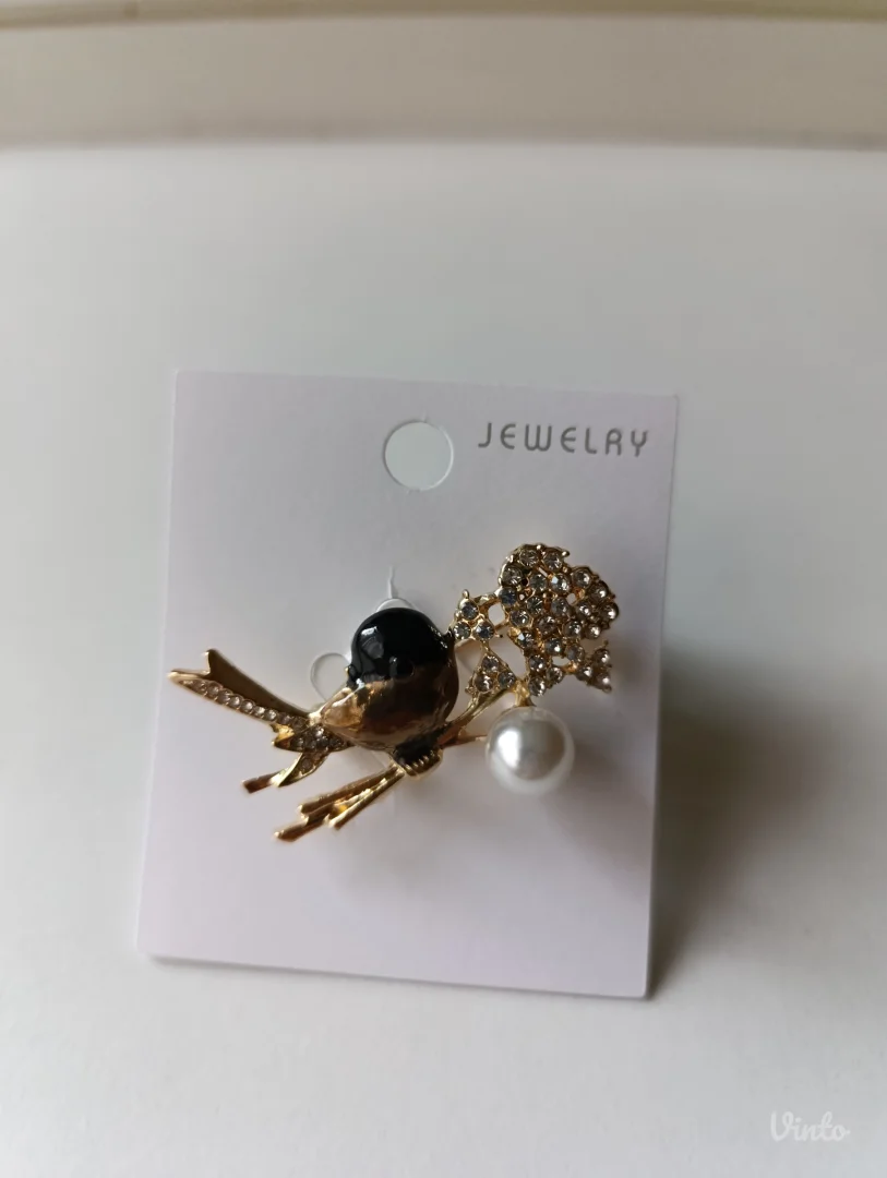 Broš - pticica na grani