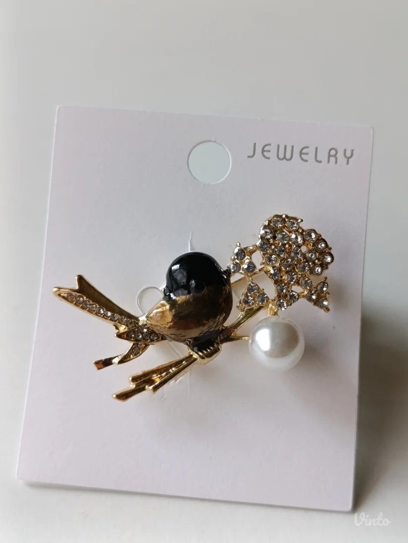 Broš - pticica na grani