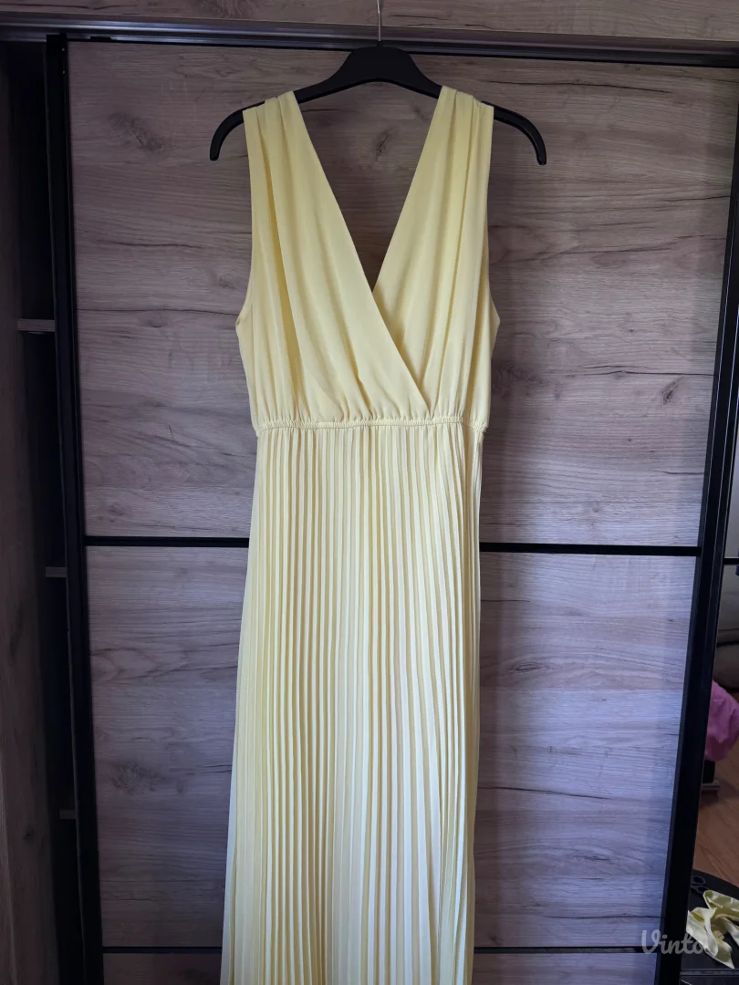 Zuta plisirana haljina