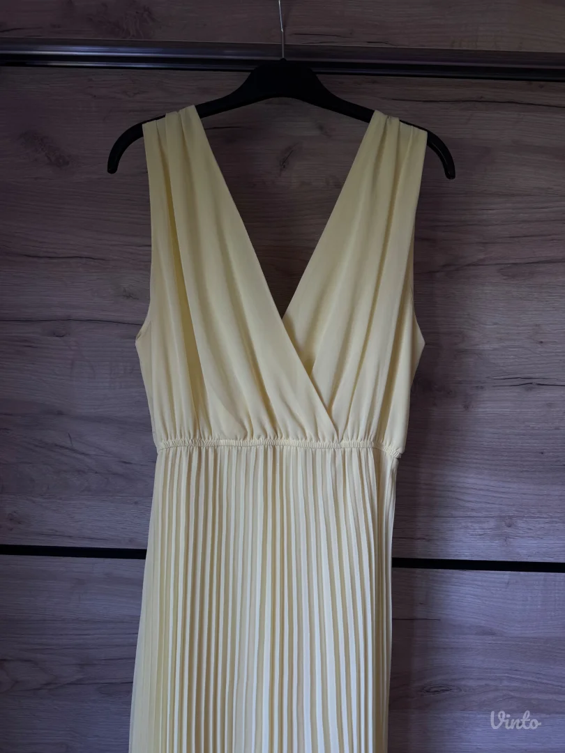 Zuta plisirana haljina