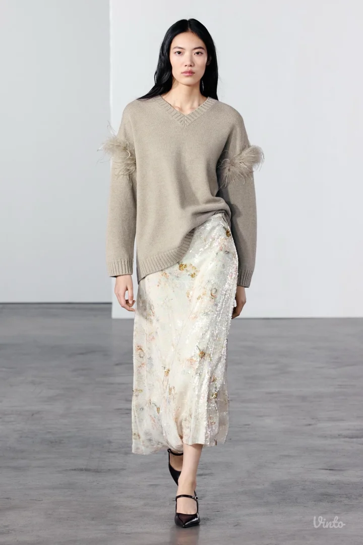 Zara midi suknja sa sljokicama