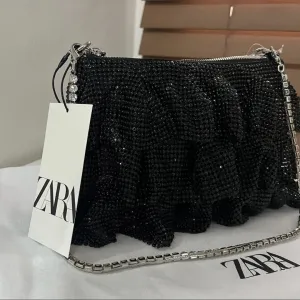 Zara cena torbica sa strasom