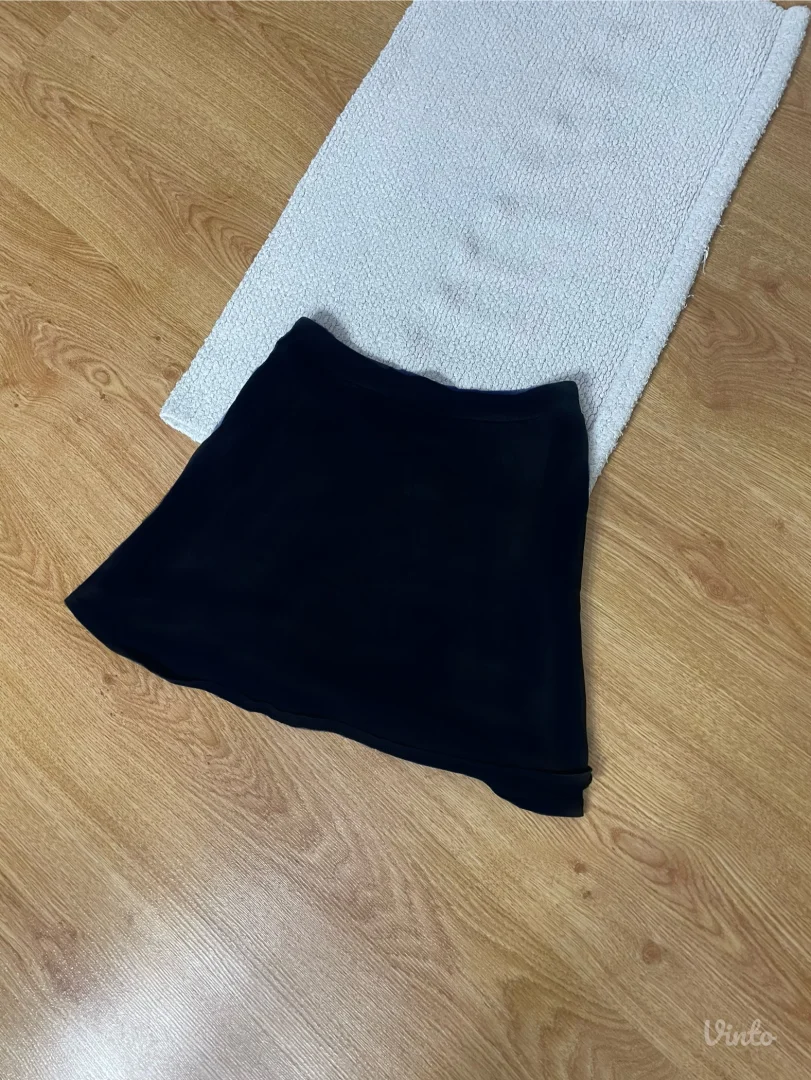 Crna leprsava suknjica