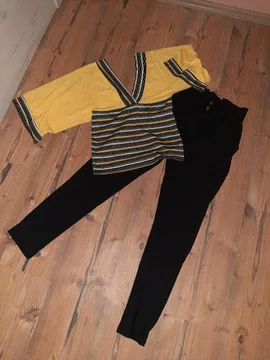 Žuta bluza I crne pantalone