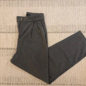 Sive pantalone