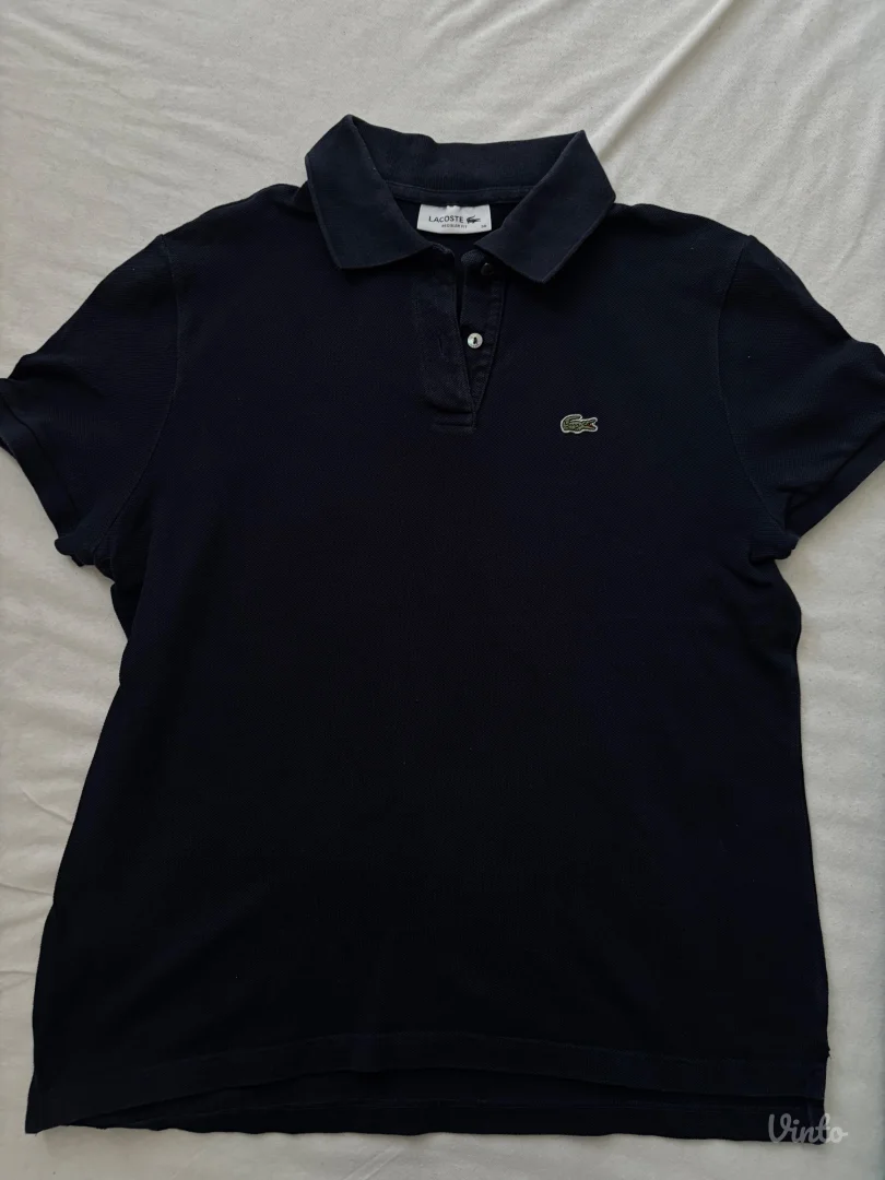 Lacoste teget ženska polo majica (Vel. 38)