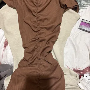 Hm braon uska haljina