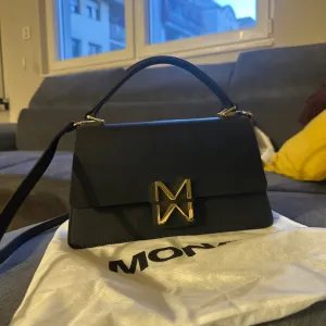 MONA TORBA