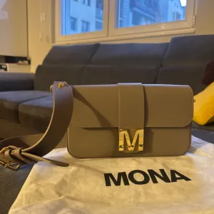 MONA TORBA