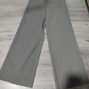 Hm pantalone Top novo