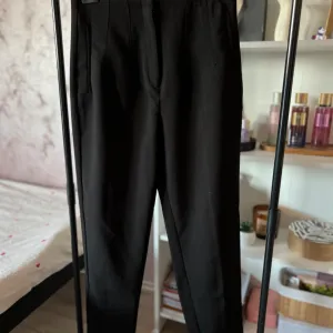 Amisu pantalone dubokog struka