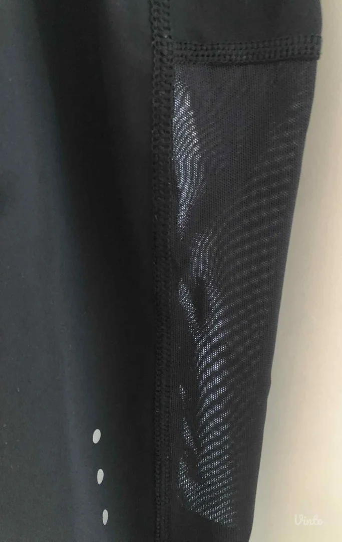NIKE DRI-FIT crne helanke (sa džepovima)